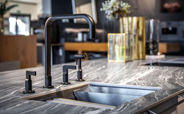 black faucet with a steel sink in a stylish modern 2022 04 22 07 02 15 utc min