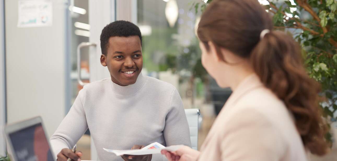 young colleagues discussing business project 2023 11 27 05 01 45 utc min 1